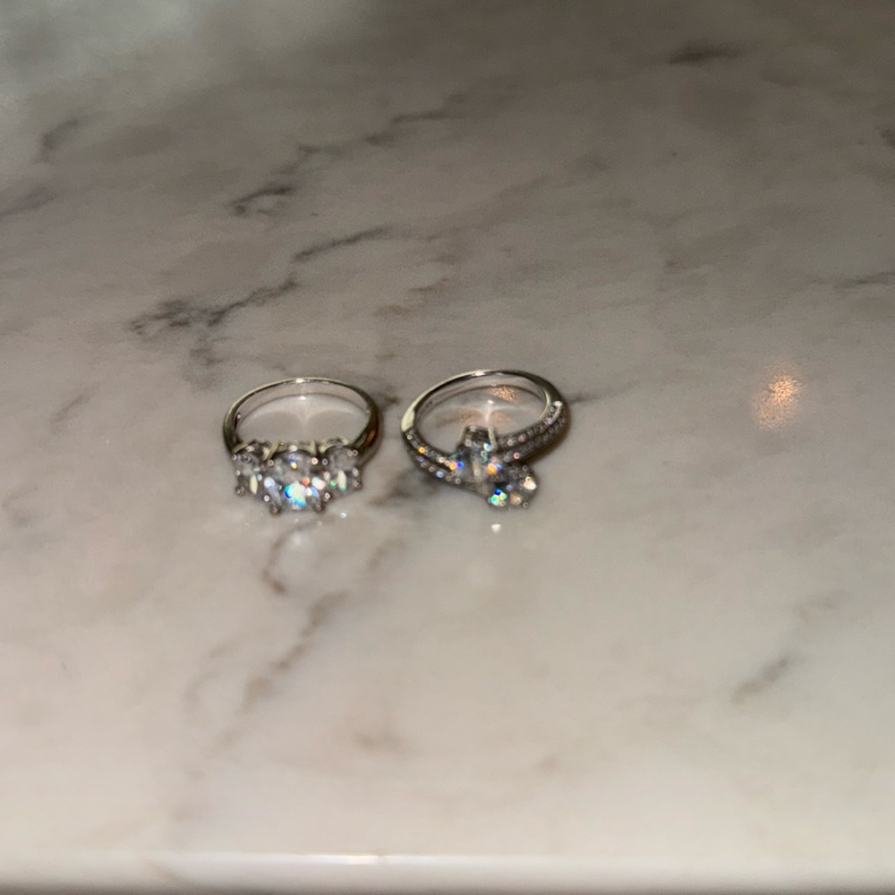 2 Diamonique Rings. Pre loved, stones are shiny and brilliant